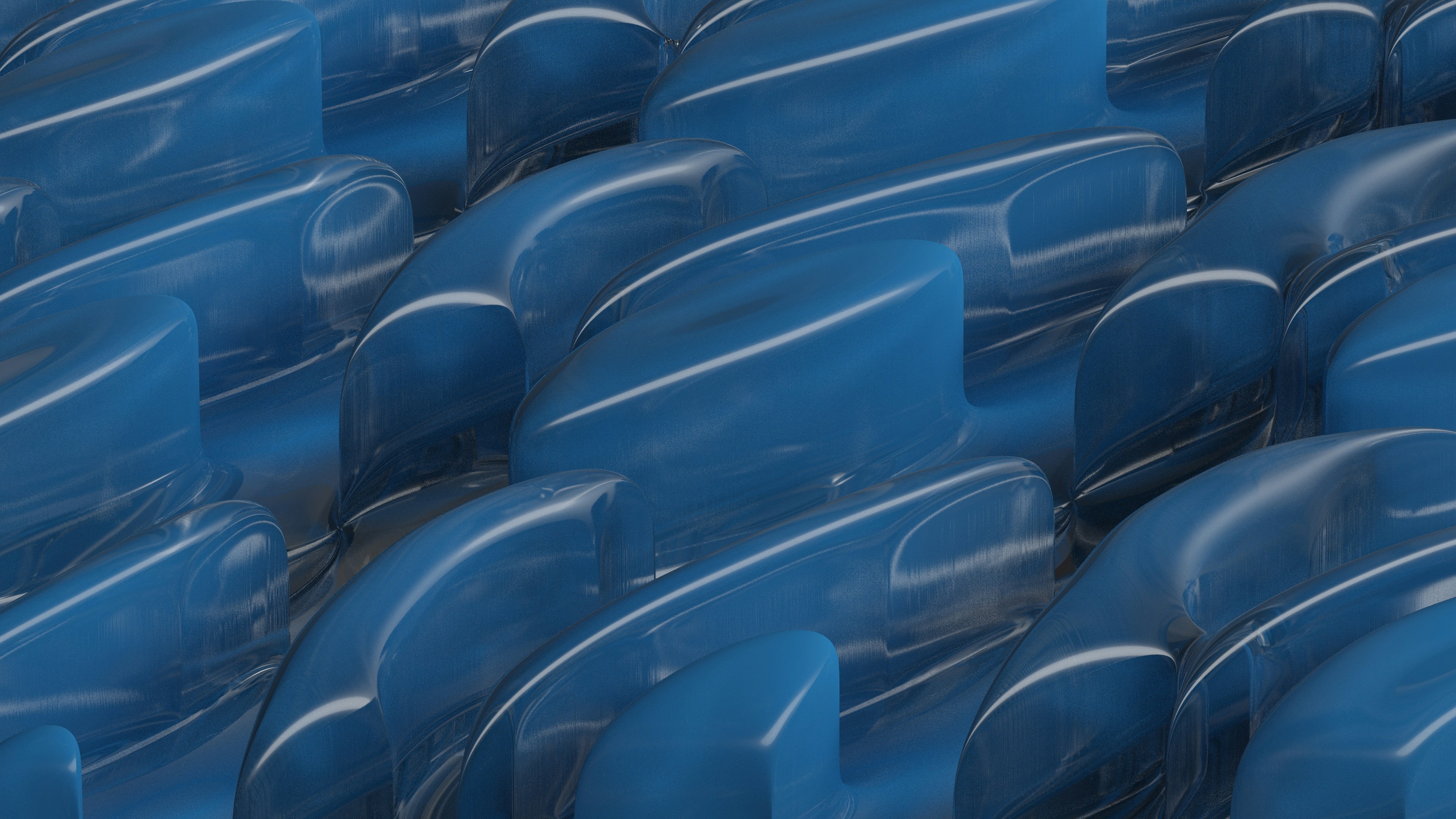 A row of blue seats sitting next to each other