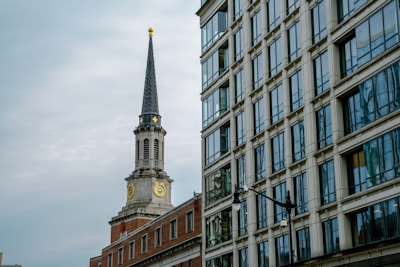 A tall building with a clock on it's side