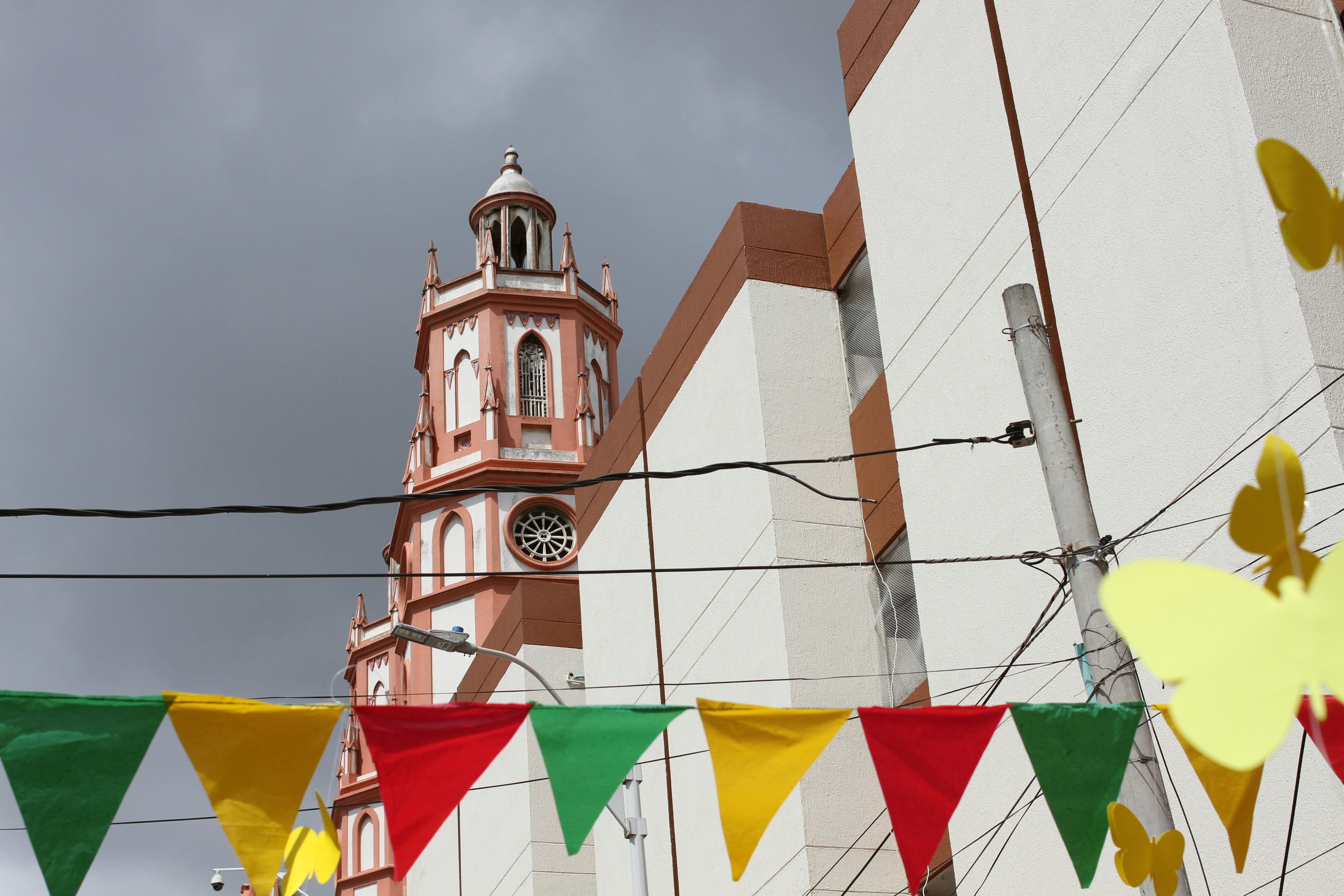 A building with a clock tower in the background