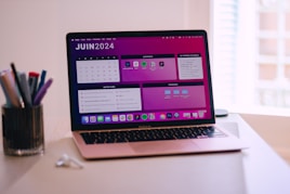 A laptop computer sitting on top of a desk
