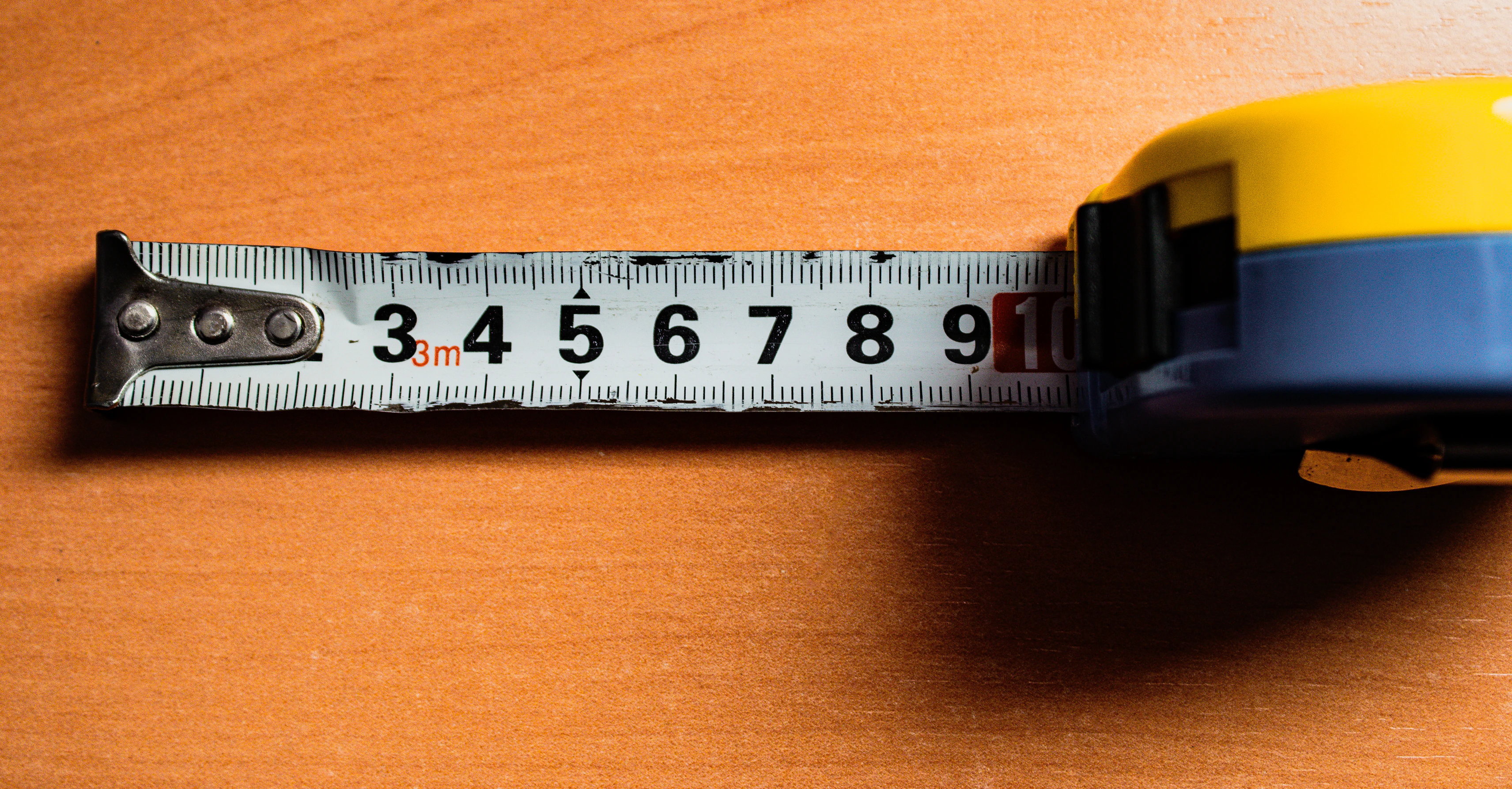 Professional Flooring Measurement with Tape Measure