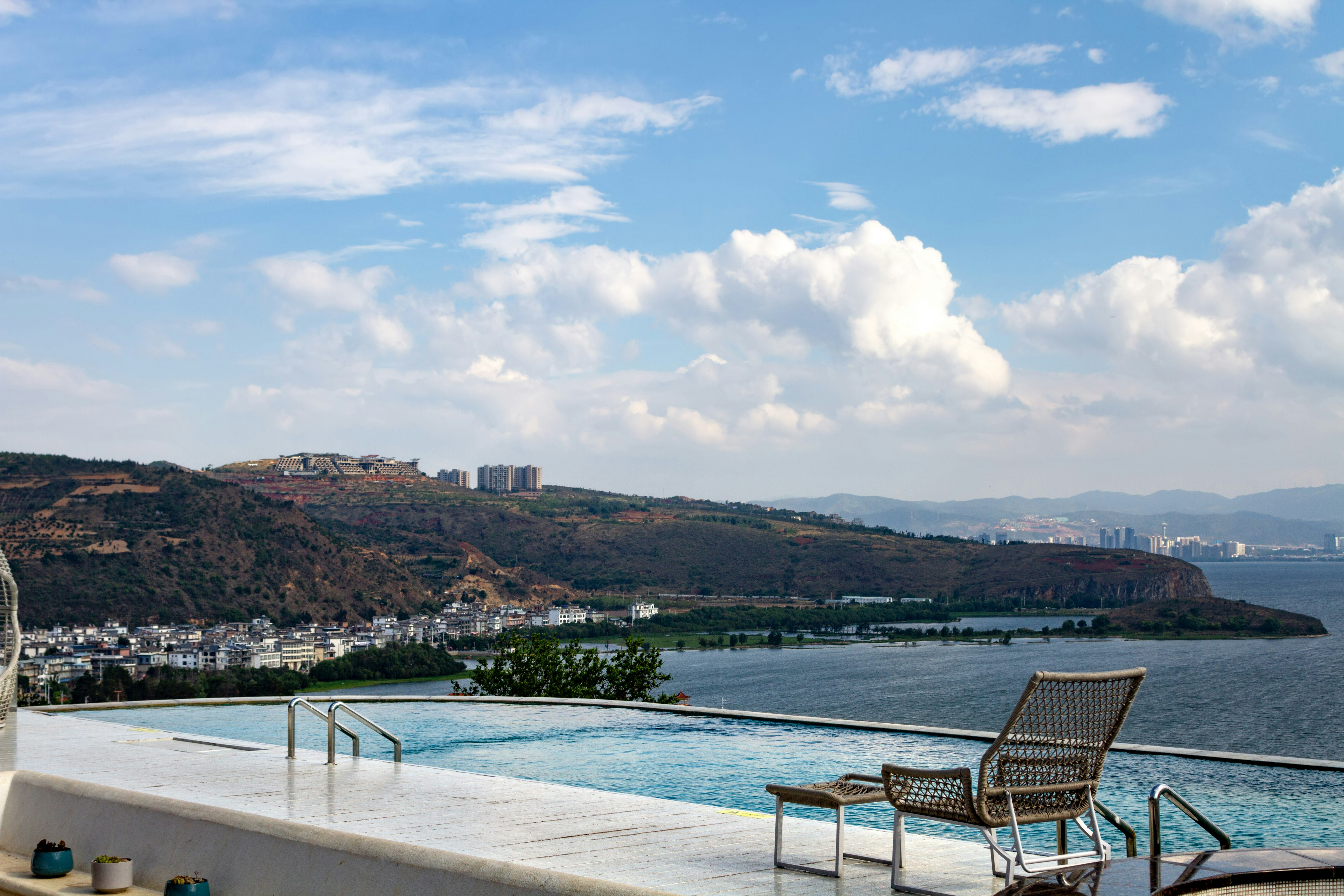 Resort-style rooftop pool with cabanas and panoramic city views. - luxury apartments Chicago West Loop