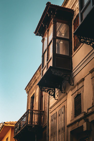 A tall building with a clock on the side of it
