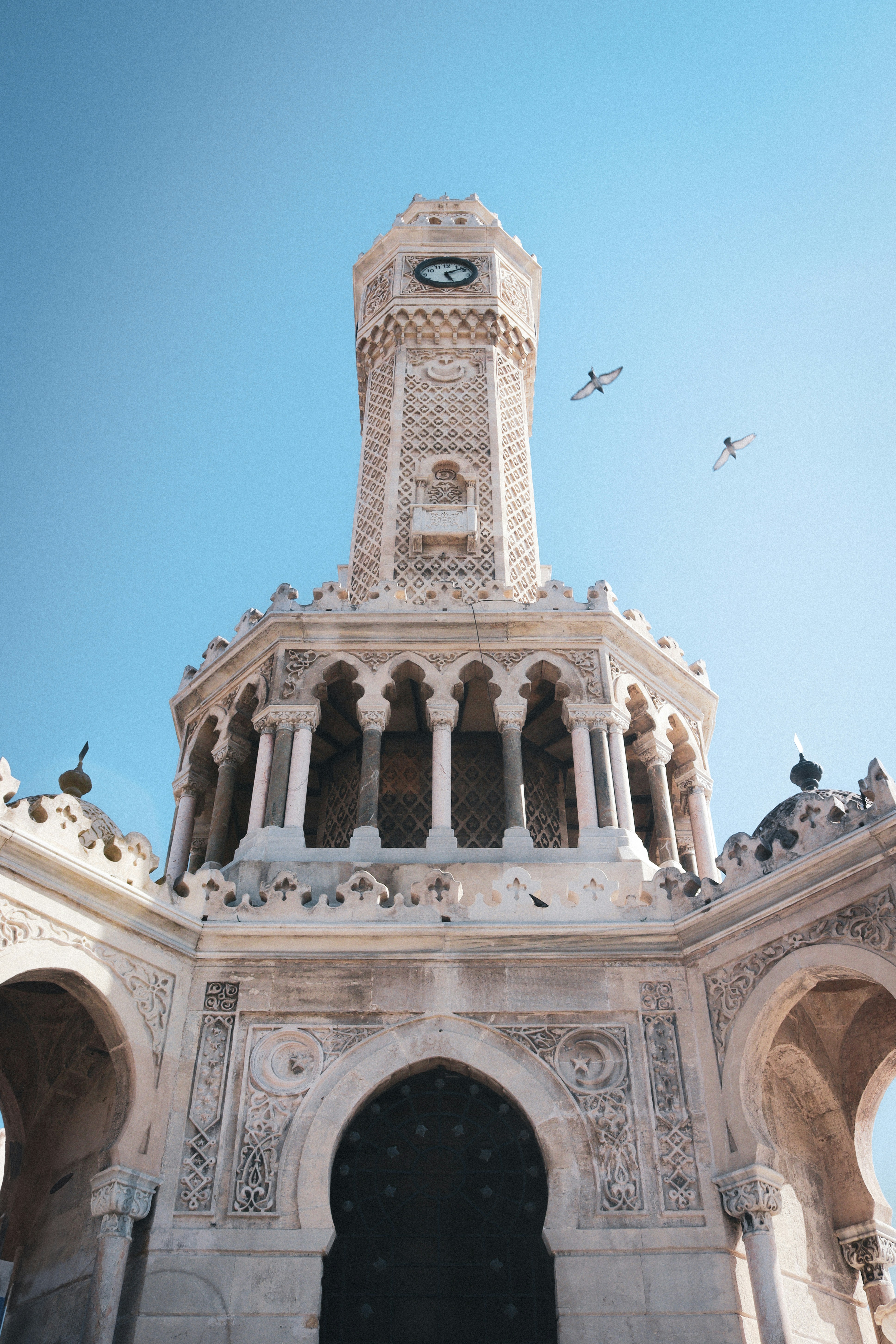 A large building with a clock on the top of it photo – Free History ...