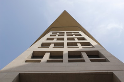 A very tall building with a sky in the background