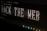 A close up of a digital clock displaying the time