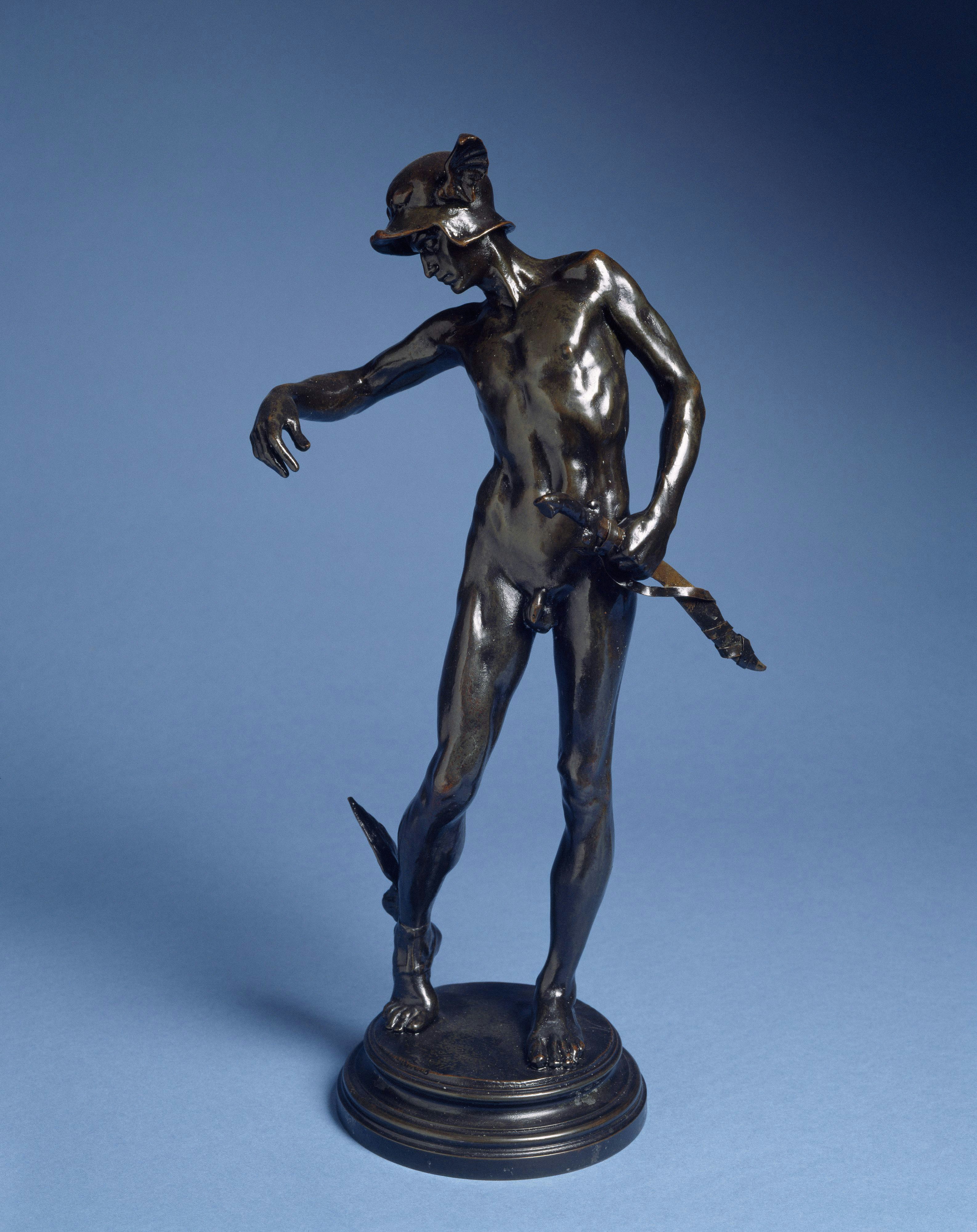 Bronze statue of a winged mercury on a pedestal