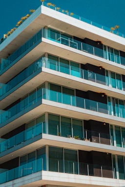 A tall building with balconies and balconies on the balconies