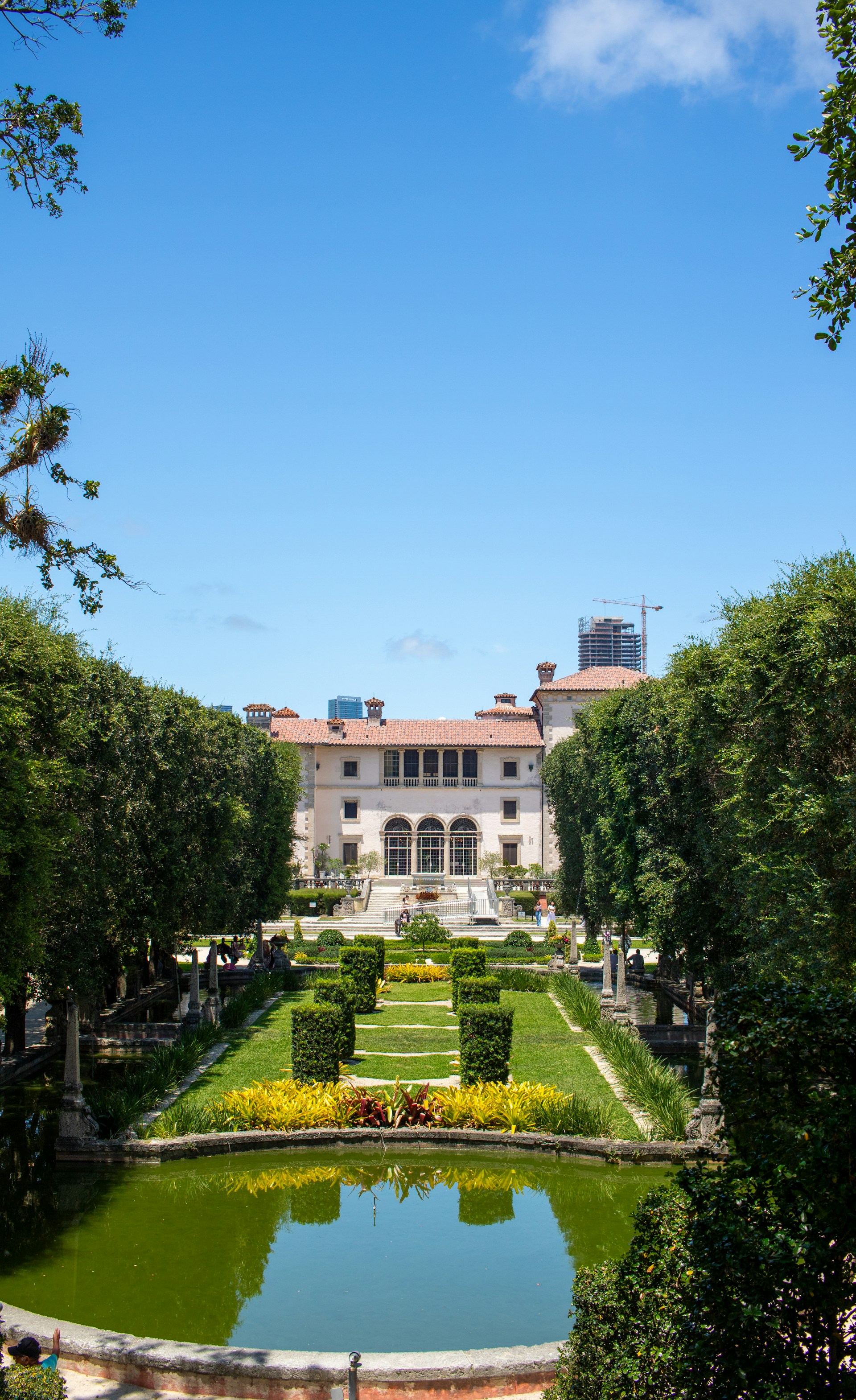 A large building with a garden in front of it