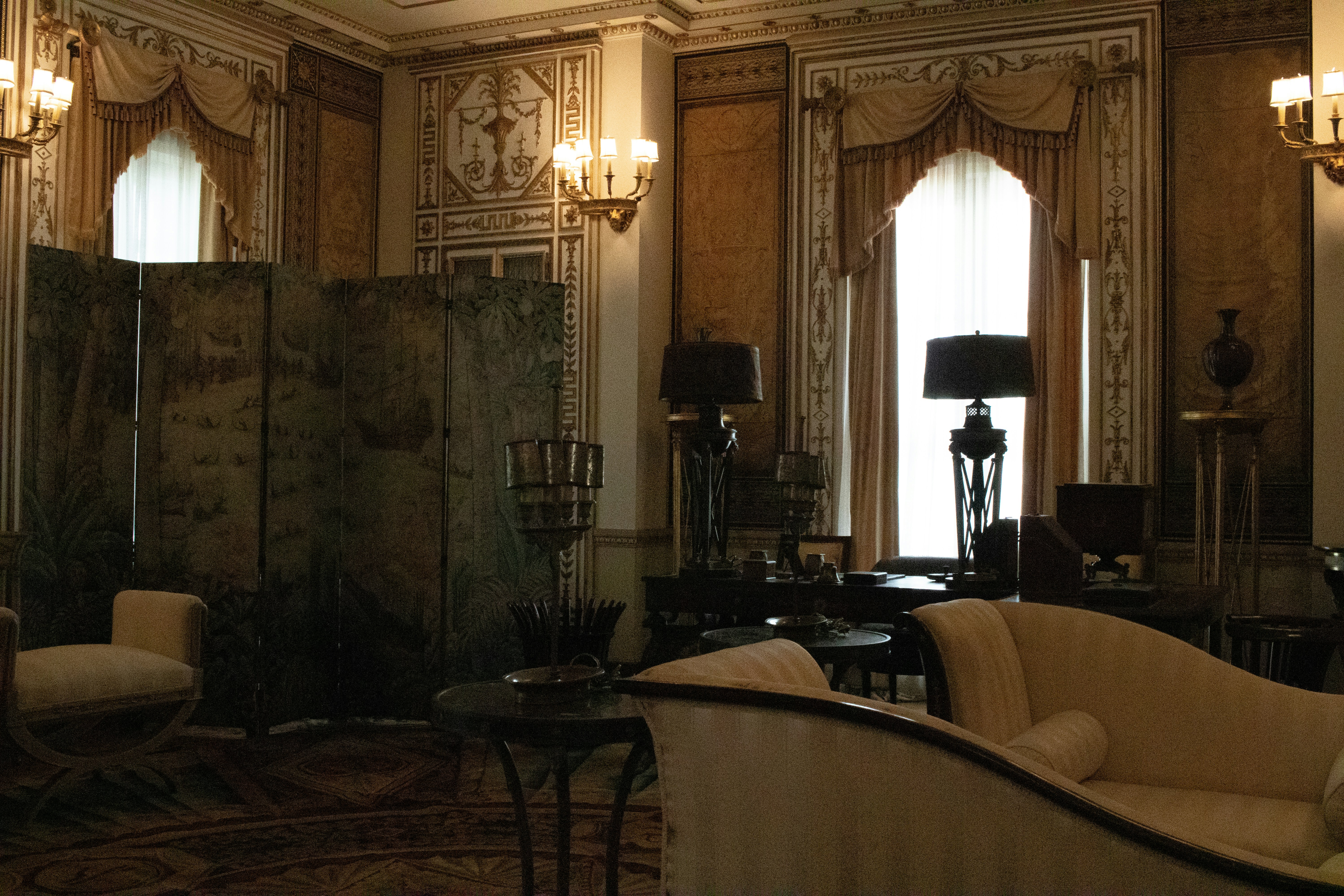 A living room filled with furniture and a chandelier