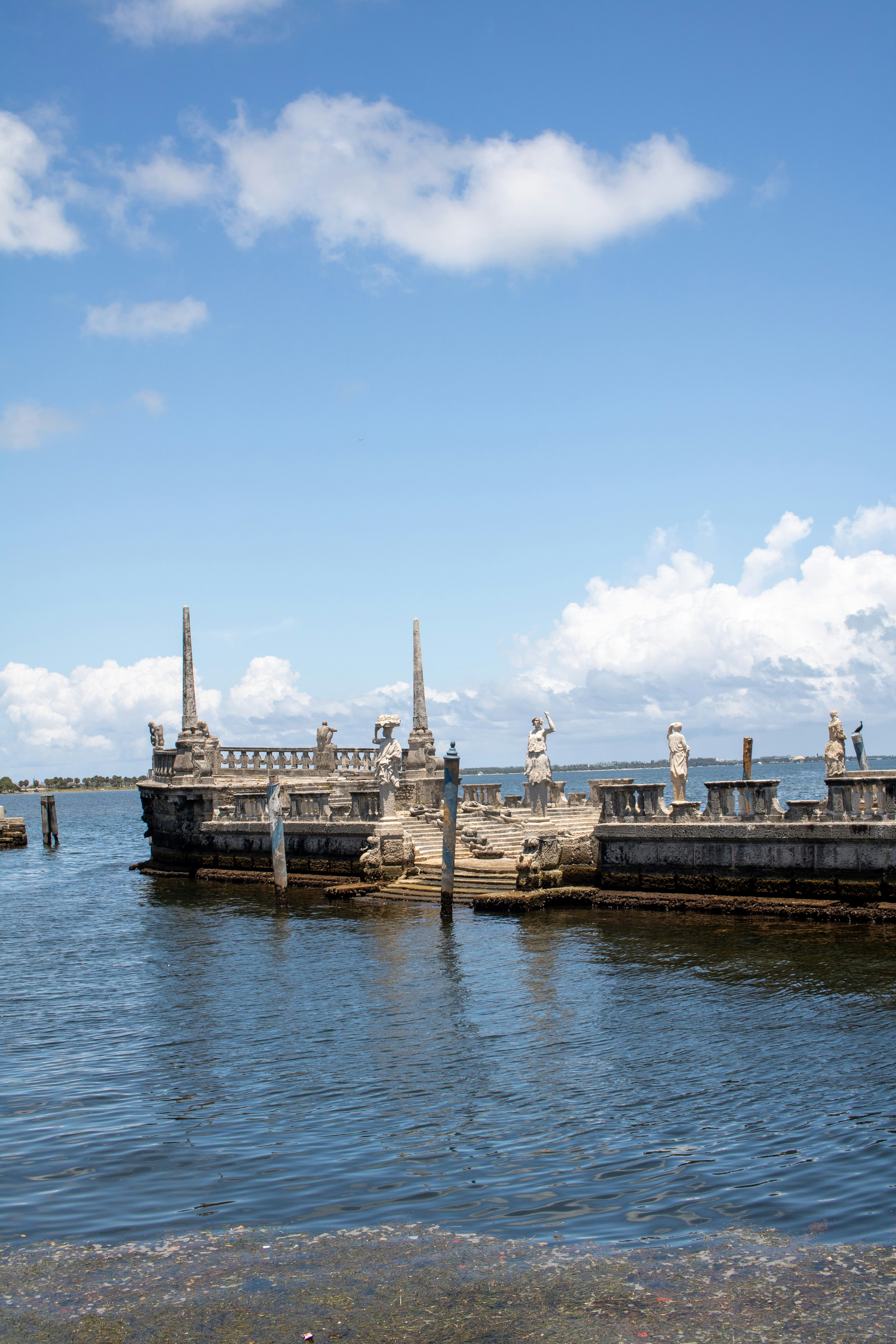 A body of water with a bunch of statues on it