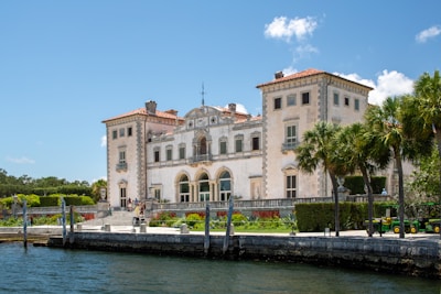 A large building sitting next to a body of water