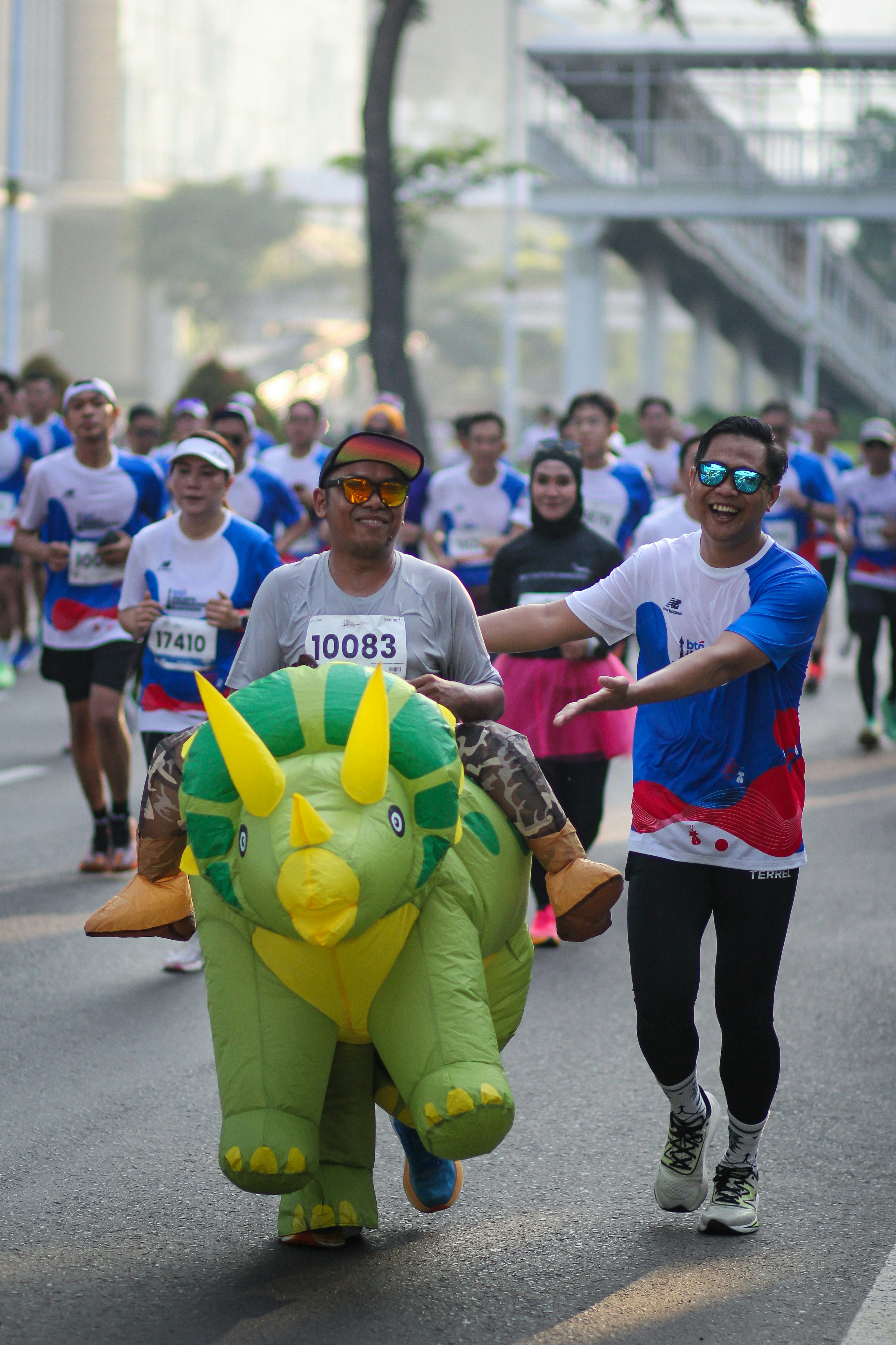 Participants wearing Beatnix Costume Shop funny costume suits during a community charity run