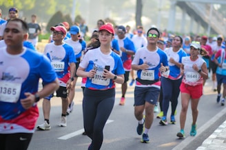 A large group of people running down a street