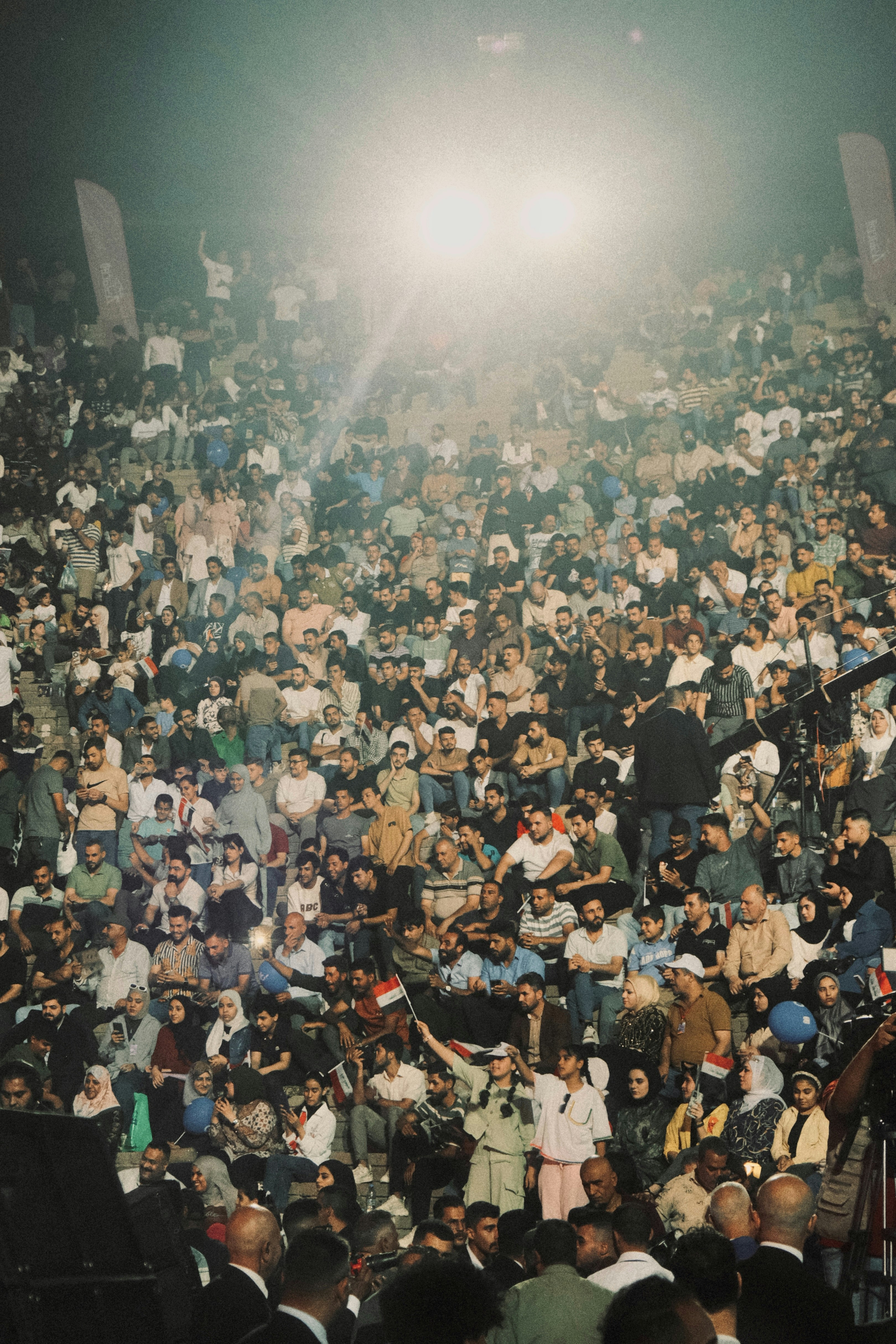 A large crowd of people at a concert