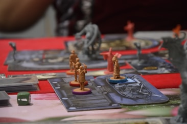 A close up of a board game with figurines on it
