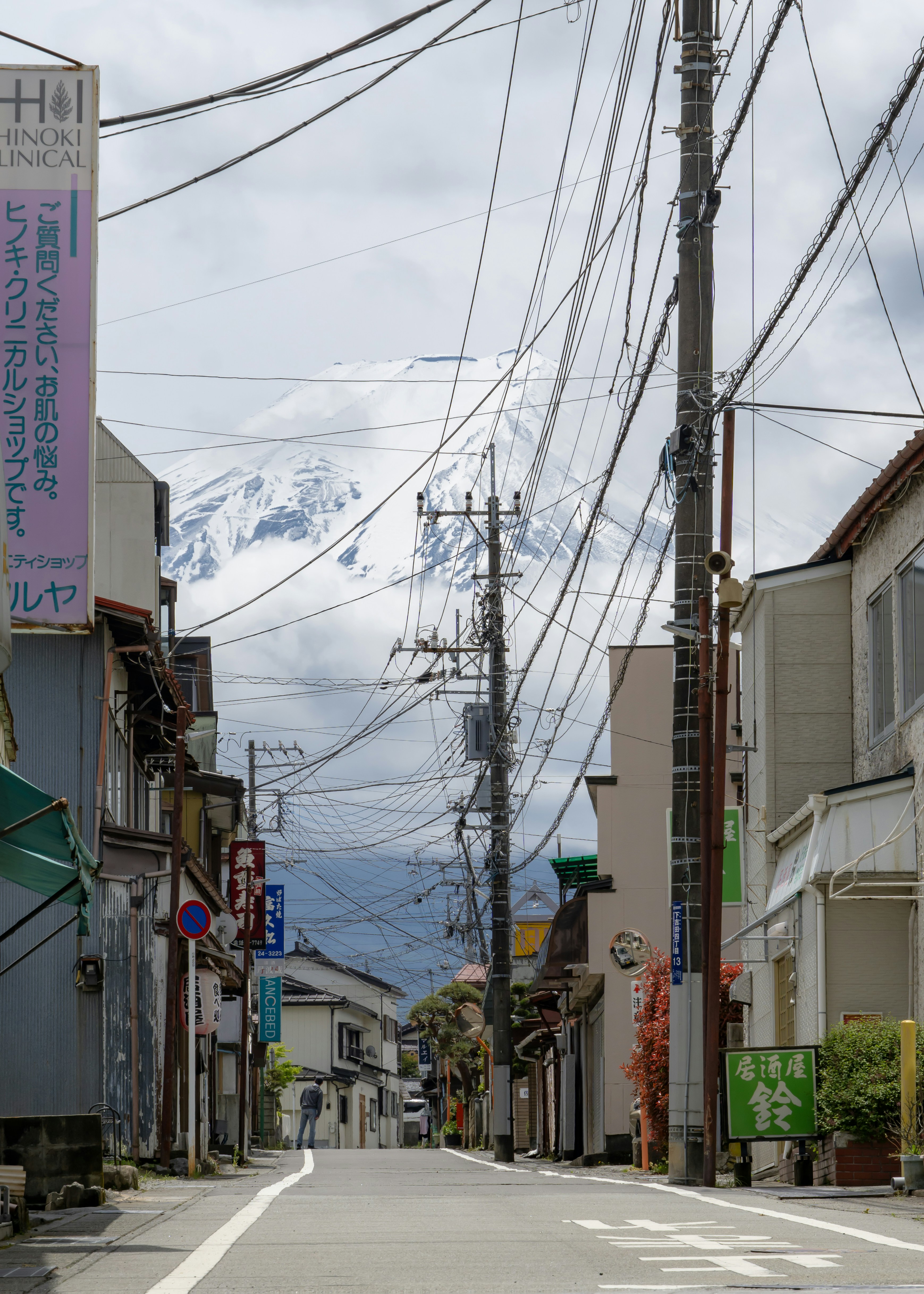 A street with a mountain in the background