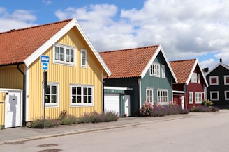 A row of colorful houses sitting next to each other