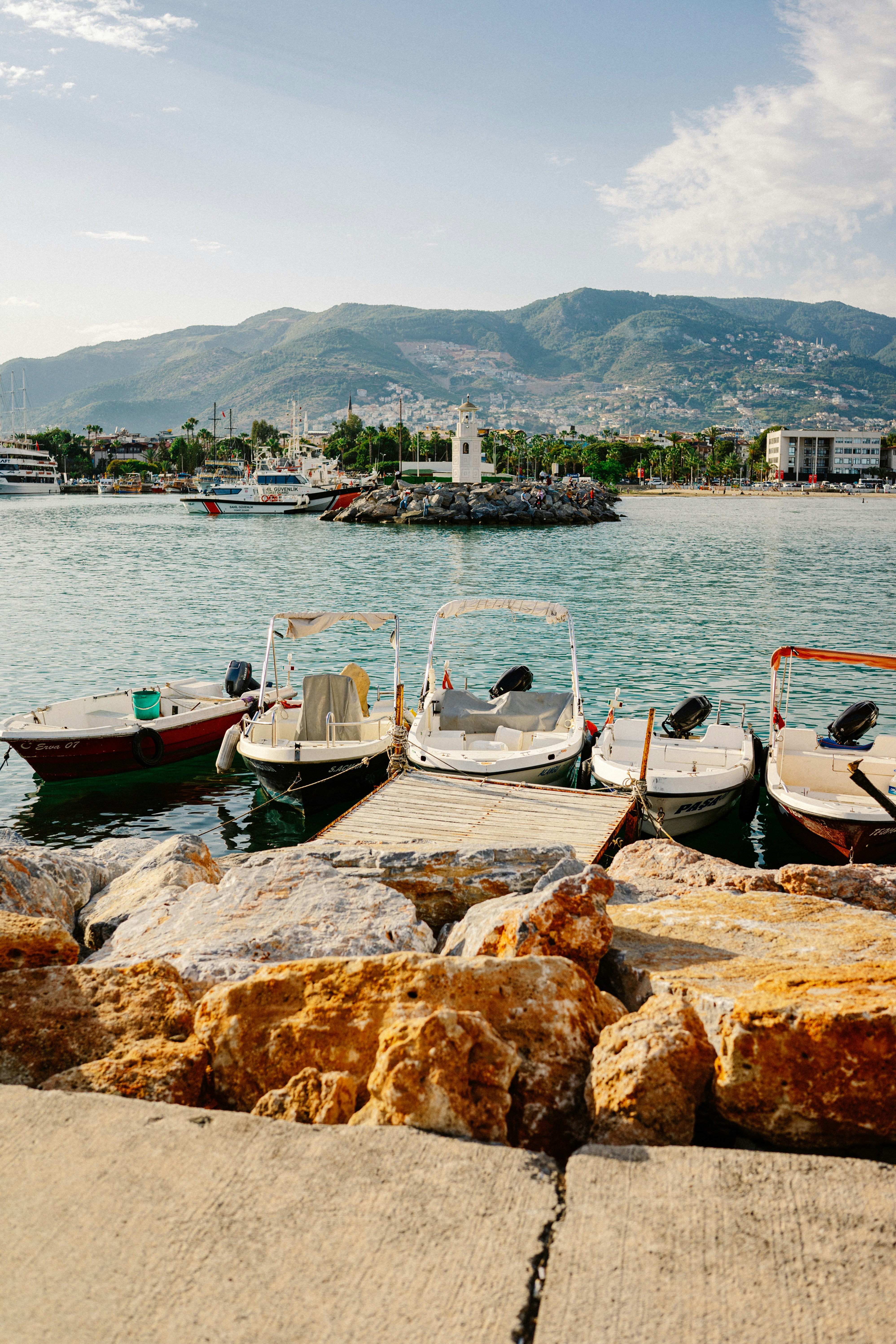 A bunch of boats that are sitting in the water