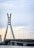 A very tall bridge over a large body of water