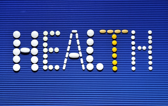 A sign that says real estate with pills on it