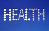 A sign that says real estate with pills on it