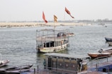 A boat floating on top of a body of water