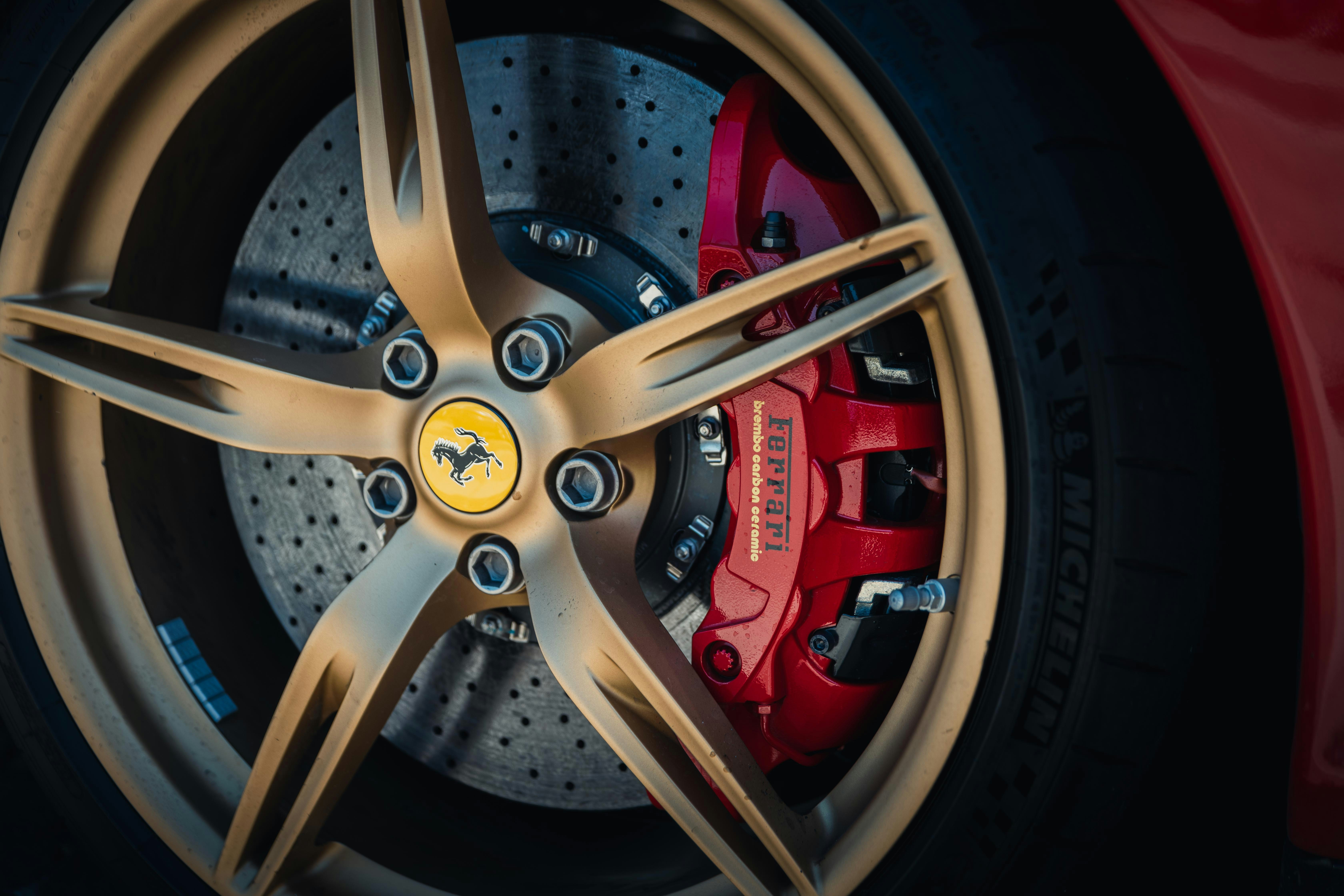 A close up of a wheel on a sports car