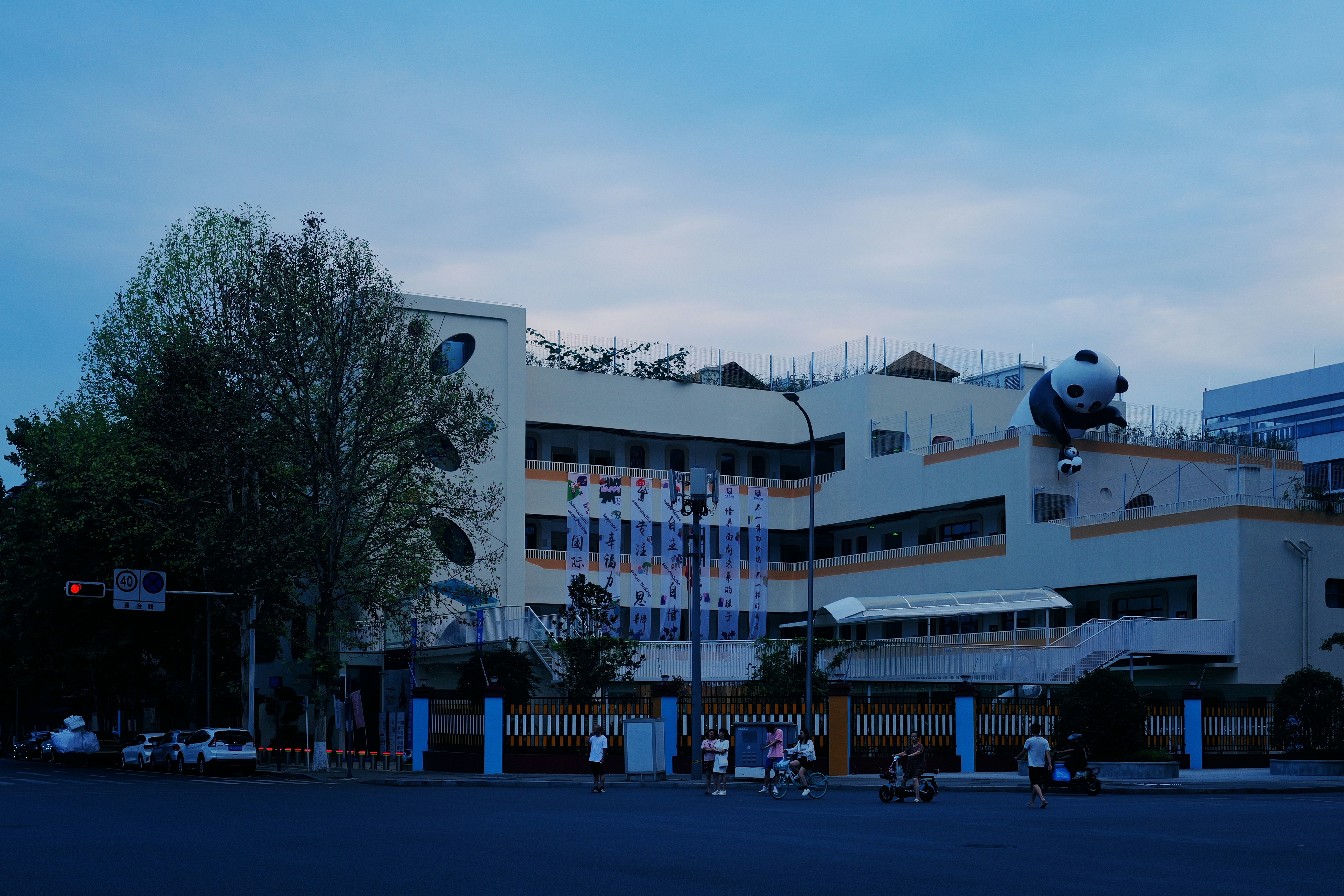 A large building with a plane on top of it