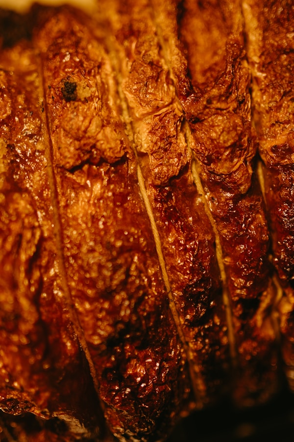 A close up of meat on a grill