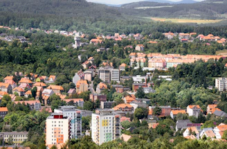 A view of a city with mountains in the background