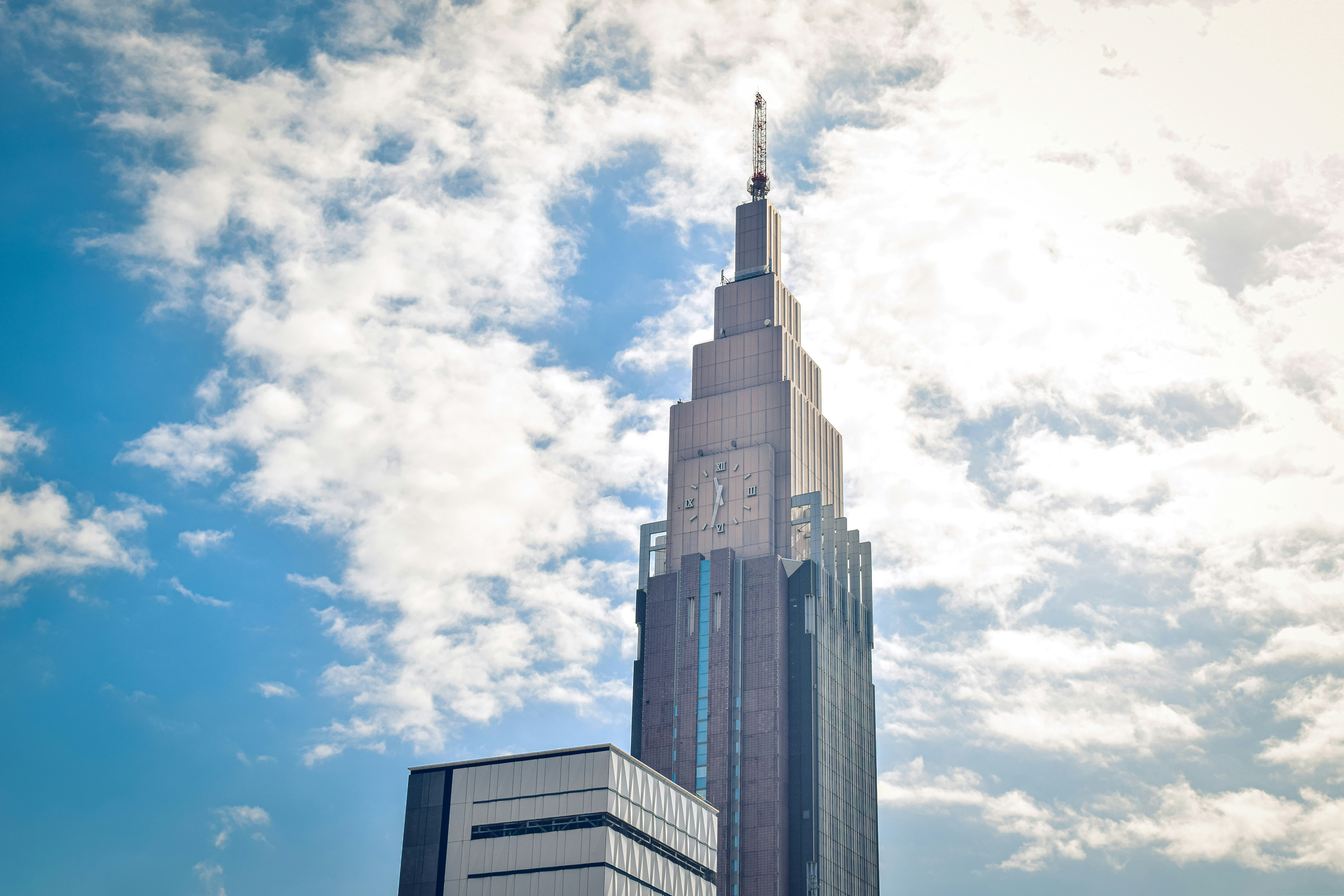 Abstract network of nodes and connections representing cloud computing.