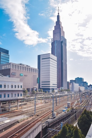 A view of a city with a train on the tracks