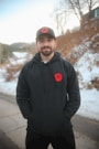 A man standing in the middle of a road