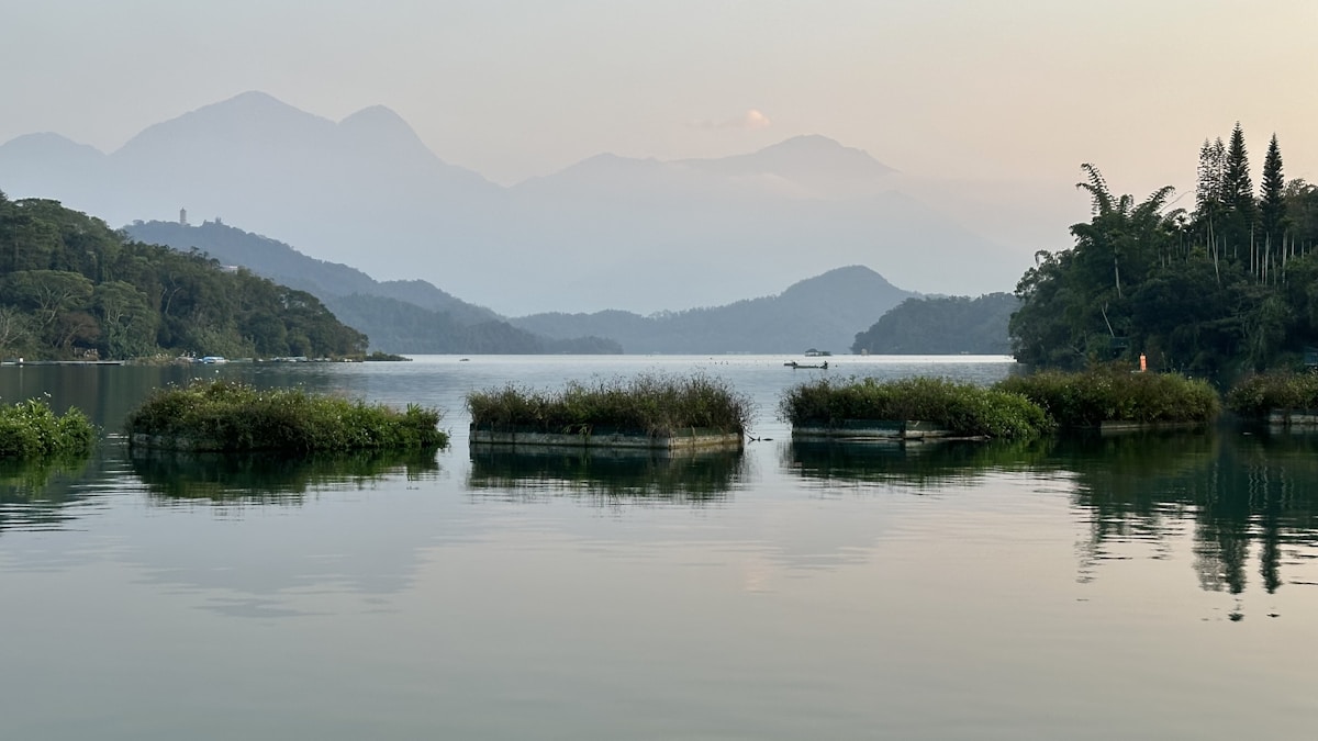 Taiwan lake surrounded by mountains and forest