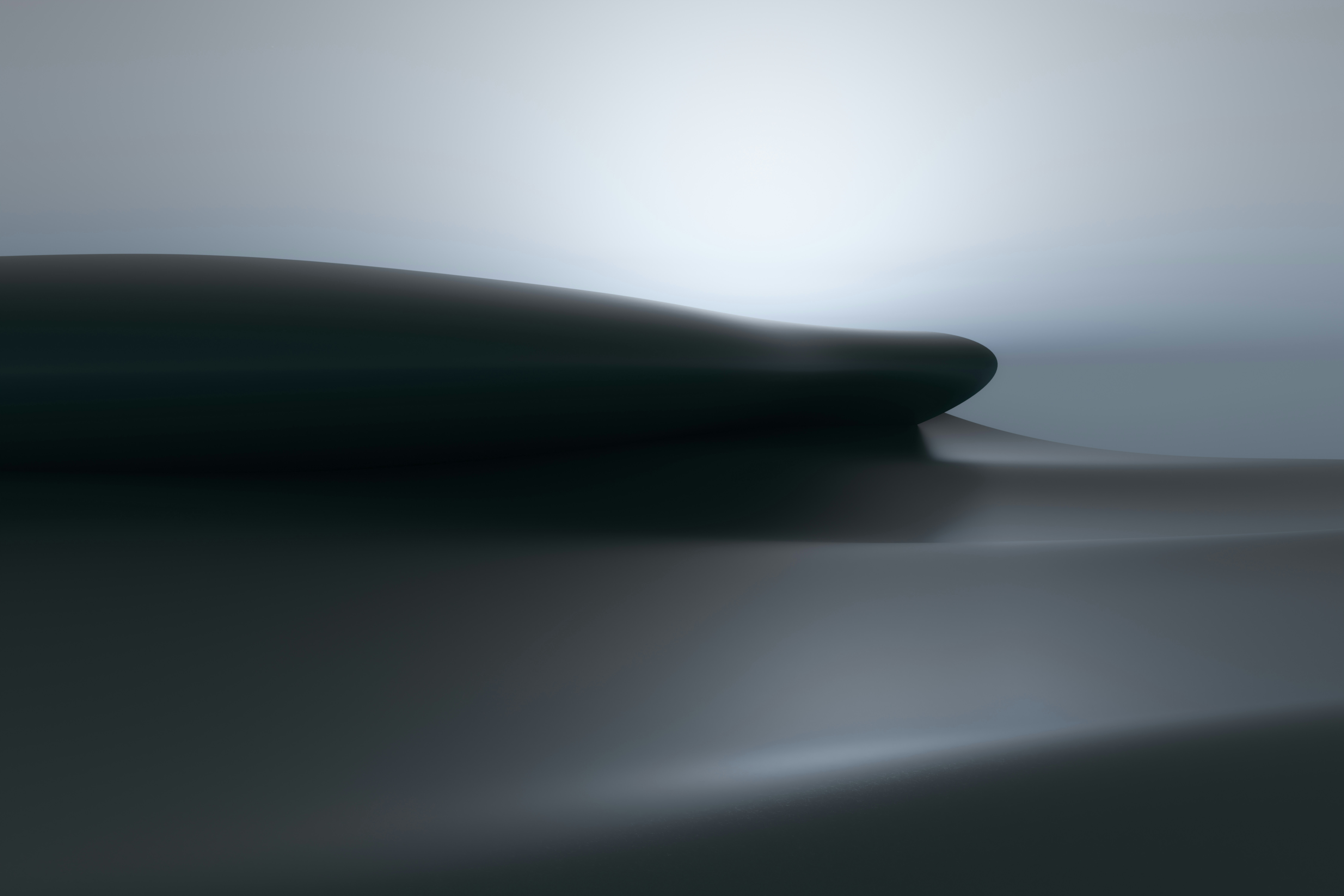 A blurry photo of a black object on a table