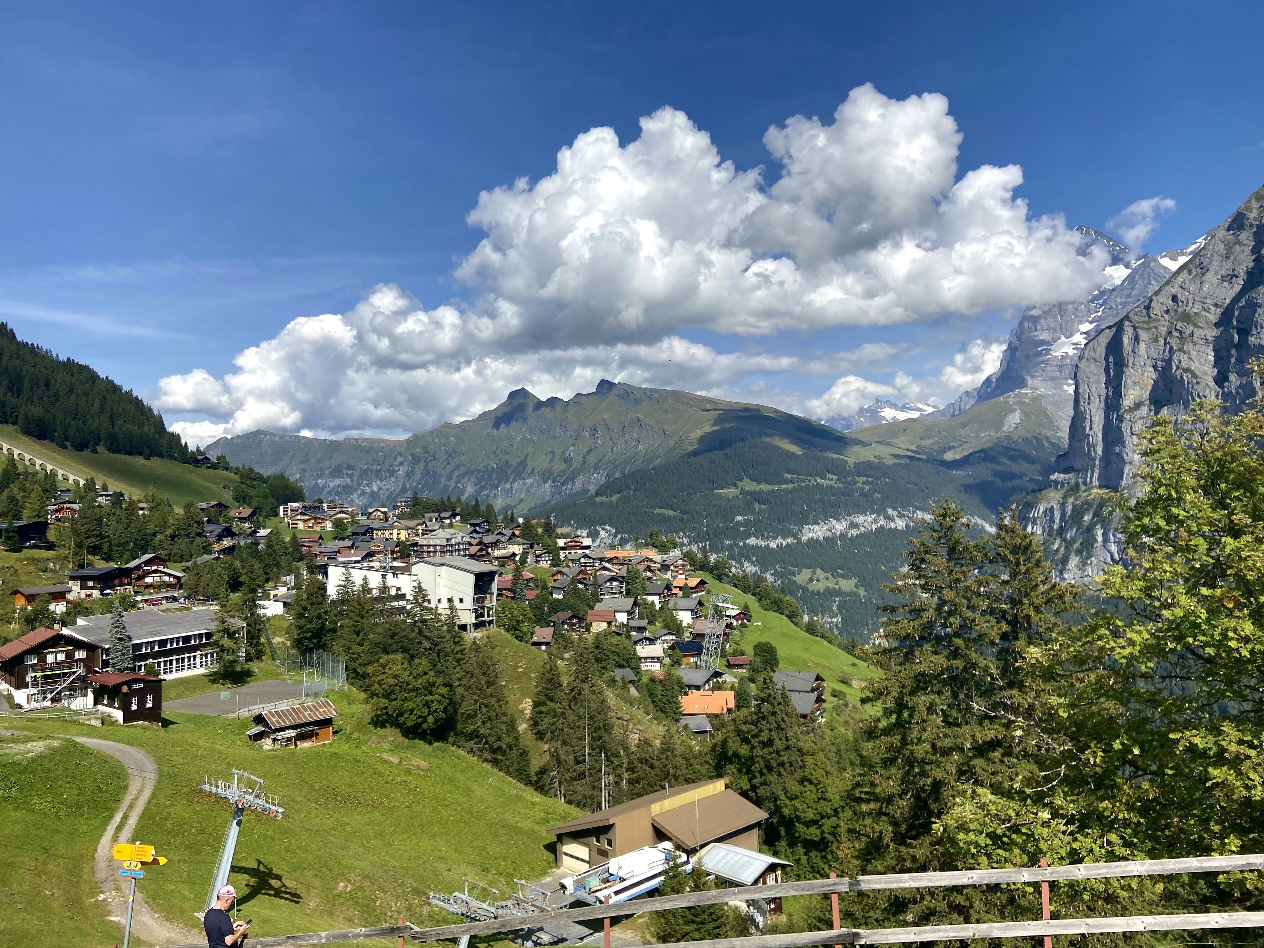 A scenic view of a village in the mountains
