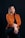 A woman sitting on a chair with her legs crossed