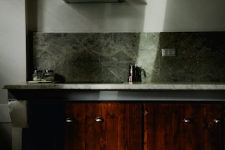 A bathroom with a sink and a toilet