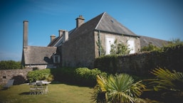 A house with a lawn in front of it