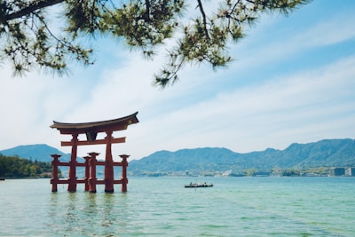 A large body of water with a red structure in the middle of it