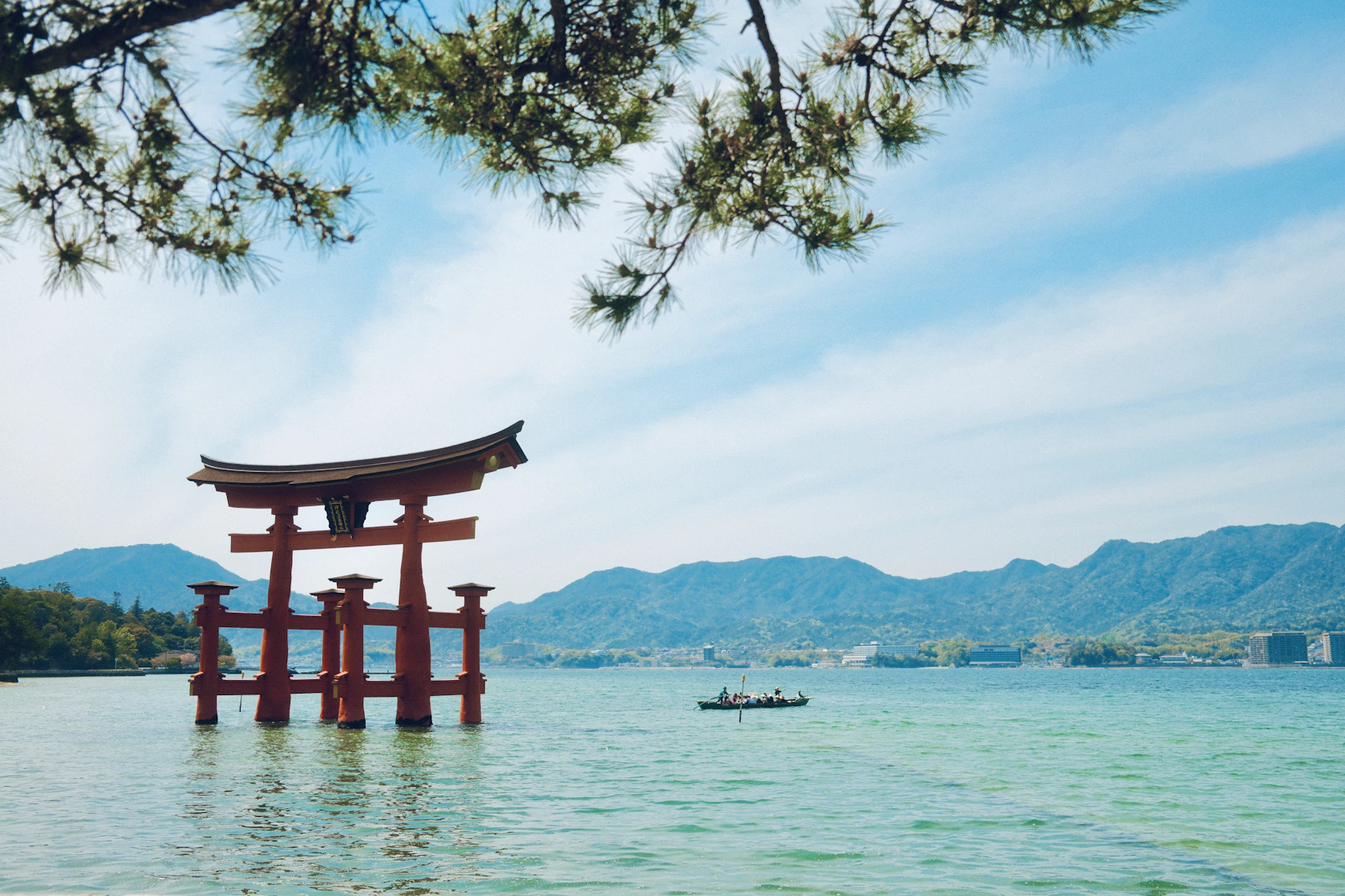 The great torii of Itsukushima Shrine standing in the sea at Miyajima