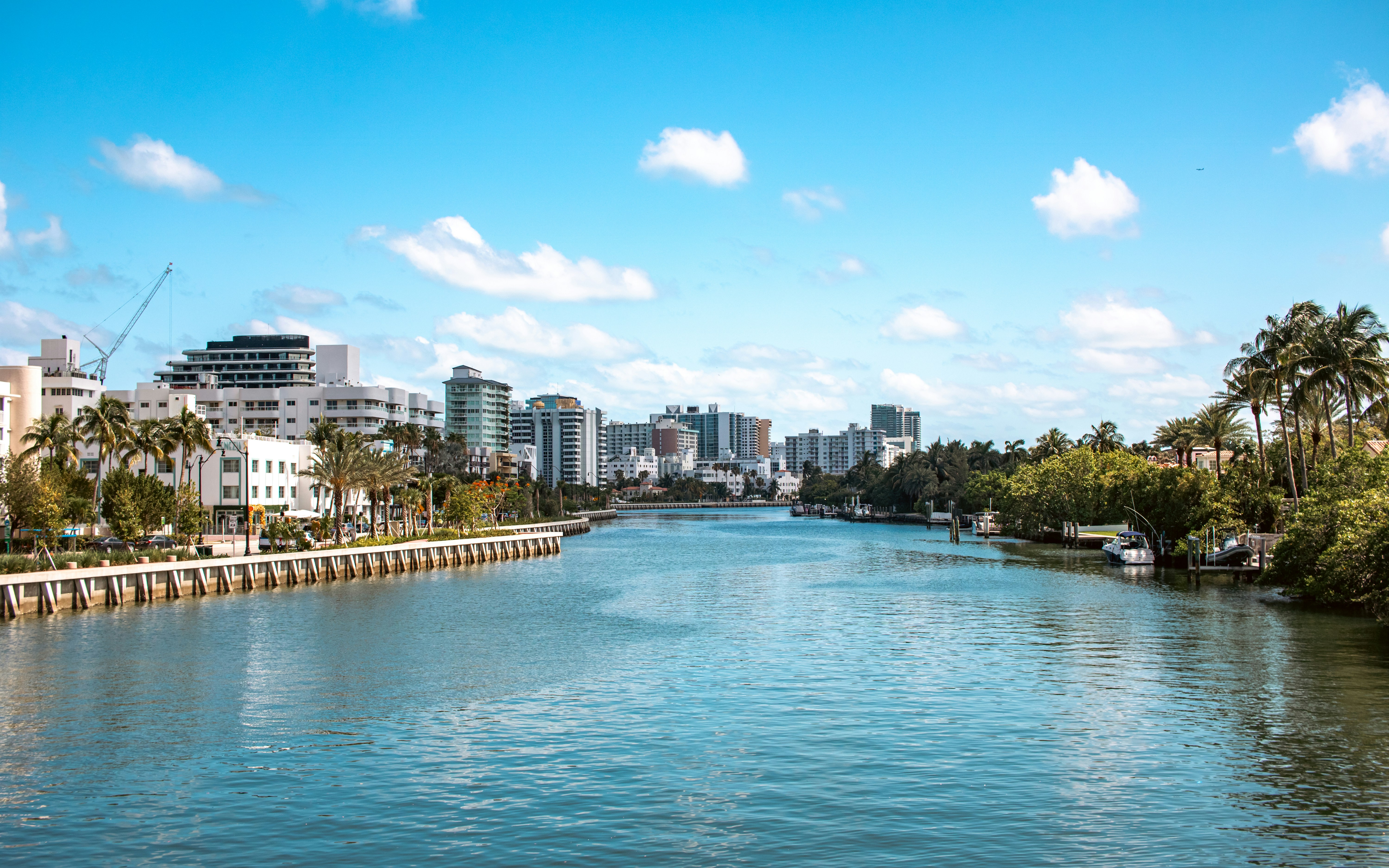 A river running through a city surrounded by tall buildings
