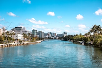 A river running through a city surrounded by tall buildings