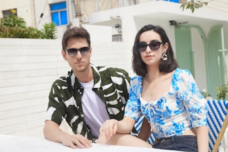 A man and a woman sitting on a bench