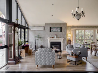 A living room filled with furniture and a fire place