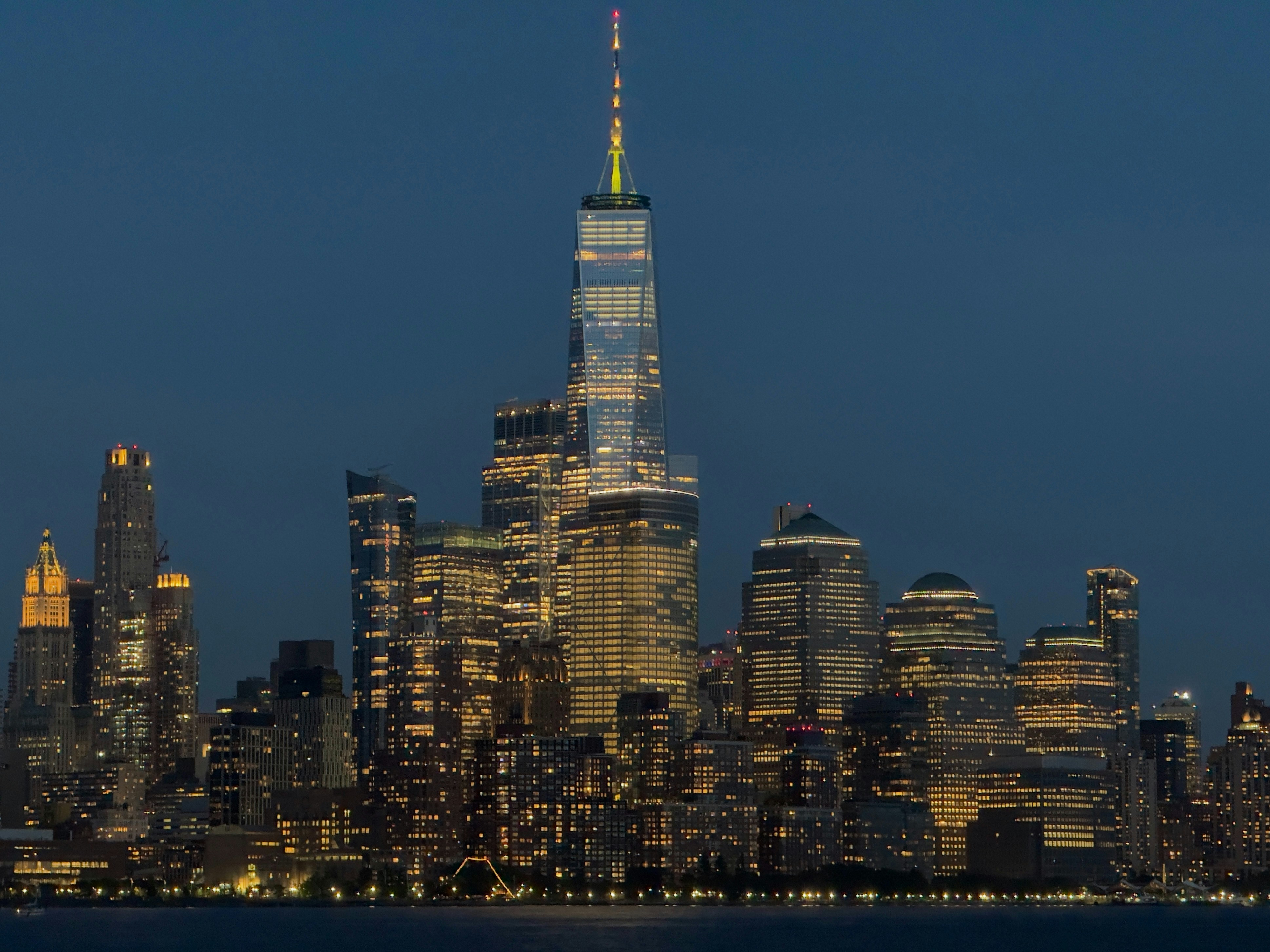A view of a city at night from across the water