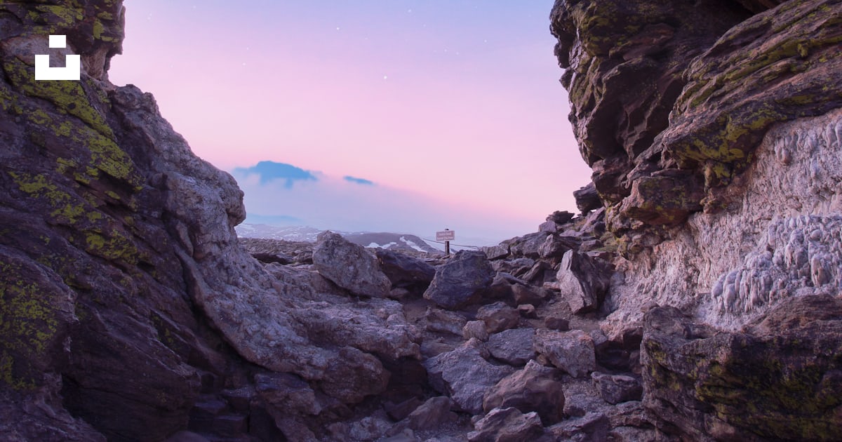 A view of the sky from between two rocks photo – Free Rocky mountain ...