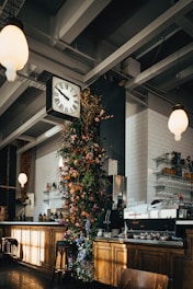 A large clock mounted to the side of a wall