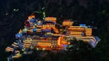 An aerial view of a city lit up at night